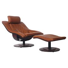 Superior quality modern lounge chair and ottoman. Mid Century Danish Modern Rosewood And Leather Swivel Lounge Chair And Ottoman Set For Sale At 1stdibs