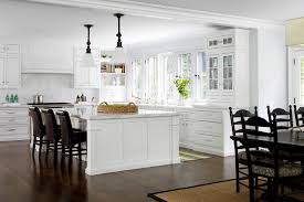 white kitchen dark floors traditional