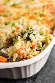 Cheesy Delicious Rice And Vegetable Casserole Recipe Made With Brown Rice Cream Of Mushroom In 2021 Vegetable Casserole Recipes Vegetarian Casserole Veggie Casserole