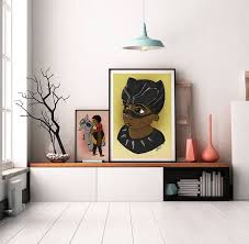 Dinky Mix African Wakanda Kids Range Inspired By The Black Panther Poster Of Baby T Challa Comic Book Inspired Ora Boy Wall Art Yellow Wall Art Boys Posters