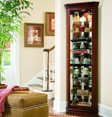 Coaster 3393 corner curio cabinet in cherry by coaster co. Pulaski Victorian Cherry Corner Curio Cabinet Pulaski Furniture 21001 Curio Cabinets