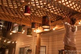 Are you looking for a pendant light but are having a hard time finding it? Tin Can Diy Outdoor Lighting Tutorial You Can Do This The Heathered Nest