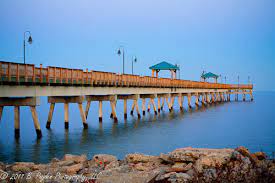 The buckroe beach fishing pier is famous for its excellent fishing for speckled trout, red drum, cobia, croakers, spot, and other saltwater fish. New Buckroe Fishing Pier B Payden Photography