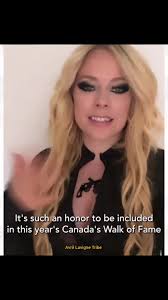 Avril Lavigne, Ryan Reynolds and Hugh Jackman attend the Deadpool & Wo...