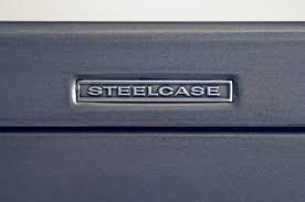 (just above the lock bar tabs, about 2/3's of the way down the face of the drawer.) using equal pressure push down on both sides forcing the lock bars down. Steelcase File Cabinet Industrial Caffeine