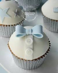 Get all the inspiration you need for the cutest sweet treats, from baby shower cupcakes to sheet cakes and more. Boy Cupcake Christening Baby Shower Bow Tie Buttons Blue White Cupcake Toppers Baby Shower Cakes For Boys Baby Boy Christening Cake Cupcakes For Boys