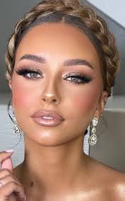 Who are recommended hair and makeup stylists for weddings in the area?