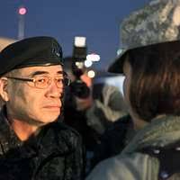 Mark Wahlberg poses with Petty Officer 2nd Class Sandra