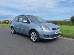 Image result for Light Ice Blue 2007 Ford