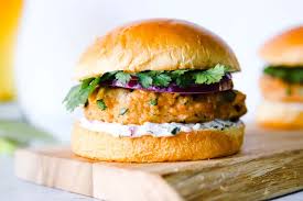 Cut the salmon into large chunks, and put about a quarter of it into the container of a food processor, along with the mustard. Grilled Salmon Burgers The Culinary Compass