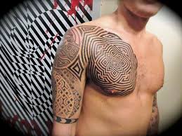 A unique placement for getting tribal soft patterns. 50 Tribal Chest Tattoos For Men Masculine Design Ideas