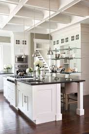 I also have medium stained wood floors, white painted cabinets, white subway backsplash and a bianco antico granite counter which has much white in the background. 75 Beautiful White Kitchen With Black Countertops Pictures Ideas July 2021 Houzz