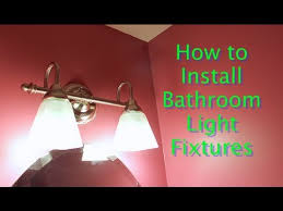 New light fixture (vanity fixture in this case). How To Install Bathroom Light Fixtures Lowe S Lighting Youtube