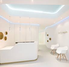 This writing desk includes a pencil drawer, spacious top, and stands on. Refined Elegance Meets Functional Fashion At Dental Angels In Barcelona Http Www Interio Dental Office Design Interiors Clinic Design Medical Office Design