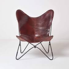 Designed by the austral group in 1938, the butterfly chair takes its. Homescapes Dark Brown Leather Butterfly Chair Vintage Style Retro Armchair With Black Steel Hairpin Legs 100 Real Leather Cowhide Modern Bkf Sling Chair Accent Chair Seat 88 Cm Tall Buy Online In