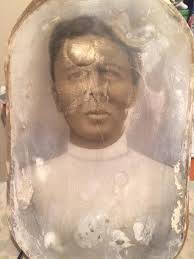 This is my grandfather, Amos Franklin Cantrell, who died while saving  another man's life in 1925. His wife is Sarah Frances Cantrell and I  believe the child is my aunt Theo, one