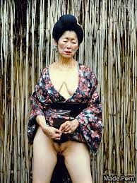 Porn image of japanese vintage skinny partially nude geisha 60 saggy tits  created by AI