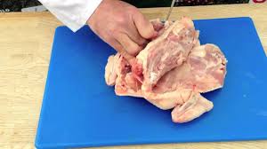 Make the first cut at the natural crease between the leg and the body. How To Bone And Roll A Whole Chicken Youtube