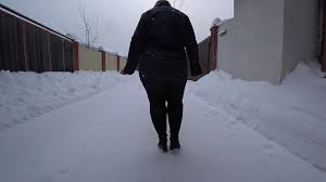 Gorgeous fat butt under a tight dress. A mature BBW walks down the street  and twirls her cnubby buttocks. - XNXX.COM