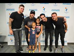 Portrait of american pop group new kids on the block posed against a white background, los angeles, california, 1989. New Kids On The Block Visit Patients At Seacrest Studios Charlotte