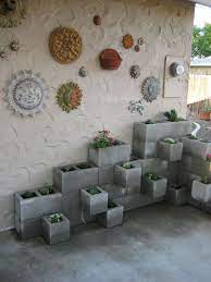 You can create one easily and cheaply by using some cinder blocks and leathered cushion. How To Repurpose Concrete Blocks Awesome Diy Projects To Try Cinder Block Garden Cinder Block Planter Ideas Concrete Blocks