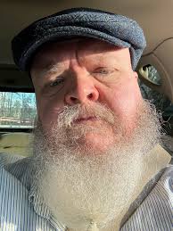 Dueling passports. Born in Belfast.