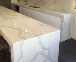 Cabinets are dove white from kraftmaid. Calacatta Quartz Countertops Review Remodeling In San Diego