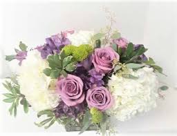 Maybe you would like to learn more about one of these? Vintage Style Centerpiece By Kennesaw Mountain Flowers