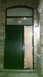 Complete your exterior door unit with a transom top lite glass. Fiberglass Door Modern Exterior Fiberglass Rustic Front Door With Arched Transom And Stainless Steel Door Handle Modern Doors