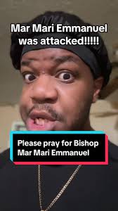 Mari Mari Emmanuel Raises Cross