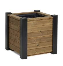 Pressure treated with a micronized copper preservative for the best protection against rot, fungal decay and termite attack this board can be used in applications such as decks, play southern pine, grown within 100 miles of the state. Tudor Wooden Planter Timber Planter Boxes Taylor Made
