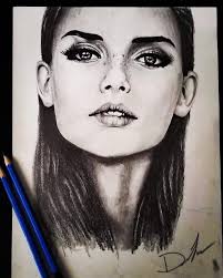 Drawing faces with graphite, charcoal, and micron