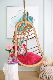 We love decorating and simple crafts!! Teen Girls Room With Rattan Hanging Chair And White Faux Bois Table Contemporary Girl S Room