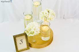 After they're clean and dry, spray paint each bottle with at least two coats of metallic paint. Elegant Gold Centerpieces Off 72 Buy