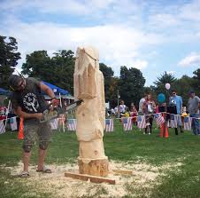 Chainsaw sculptor Jesse Green brings King Philip to life in Raynham