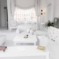 In lieu of purple walls, we'd keep the walls neutral and bring in color with a. Friends All White Living Room Apartment Therapy