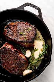 Once the steaks get a nice sear on both sides you will finish them off in a hot oven until they've reached the desired internal temperature. How To Cook Filet Mignon Garnish Glaze