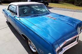 This powerplant features overhead valve valve gear, a 90 degree v 8 cylinder layout, and 2 valves per cylinder. 1967 Chevrolet Impala Story Motorious