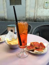 I think you are asking for the word used when we have a drink before dinner. Drink In Rome