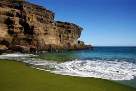 Olive Green Sands Of Papakolea Beach Are Located Near The Southern Tip Of Hawaii S Big Island The Sand Green Sand Beach Hawaii Beaches Green Sand Beach Hawaii