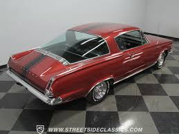 Image result for Medium Red 1965 Barracuda