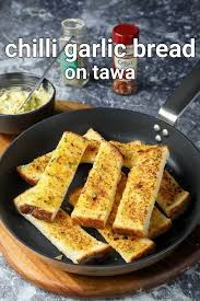Chilli Garlic Breadsticks Recipe Chilli Garlic Toast Sticks Garlic Breadsticks Recipe In 2020 Vegetarian Snacks Recipes Recipes Foood Recipes