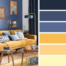 In this cozy bedroom, pale yellow and cornflower blue create a restful scene. 100 Color Inspiration Schemes Blue Yellow Color Palette Colorpalette Color Color Palette Living Room Living Room Color Schemes Living Room Color