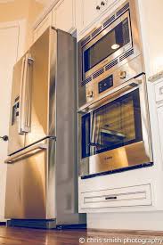 Kitchen Cabinet Homecrest Cabinetry Jordan Maple Ivory Mocha Glaze Perimeter Maple Buckboard Island Kitchen And Bath Showroom Kitchen Sale Kitchen Remodel