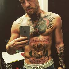 Mcgregor has two large tattoos, one on his chest and the other on his abdomen. Conor Mcgregor S Tattoo Showing Mcgregor And