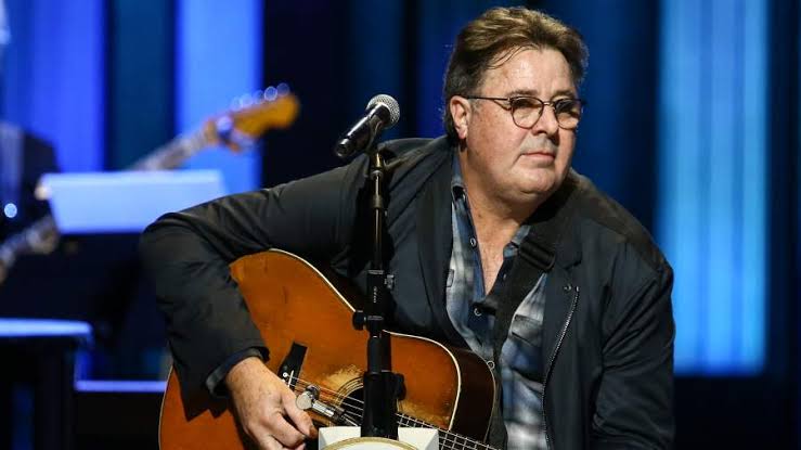Vince Gill Presents Two Schools With $100,000 Worth Of New Instruments |  iHeart