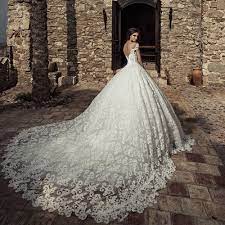 Corona Borealis Julia Kontogruni S High End Bridal Line Features Intricately Embellished Gowns That Chann Wedding Dresses Wedding Dresses Beaded Bridal Gowns