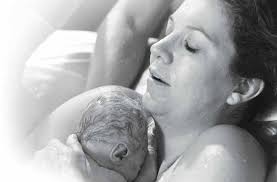 Katie's water births went swimmingly One by land, two by sea