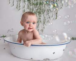 When it's time to unwind, her doll can take a pretend soak in a bubbly bathtub. Simple Fun One Year Milestone Bubble Bath Baby Milk Bath Bath Photography Baby Bath