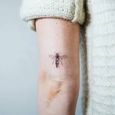 Small Realistic Bee Tattoo On The Back Of The Left Upper Arm Bee Tattoo Elbow Tattoos Queen Bee Tattoo